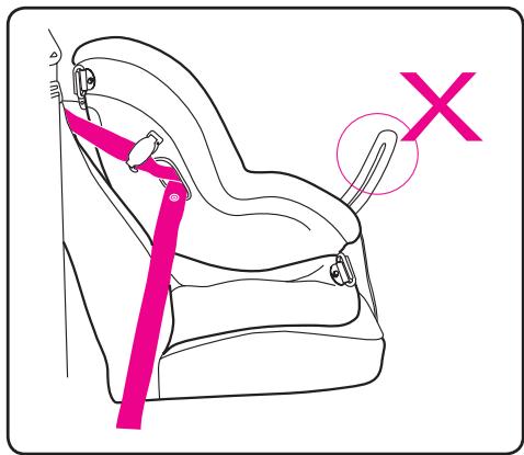 Diagram showing a car seatbelt buckle with a pink safety belt and a red X mark indicating a specific location.