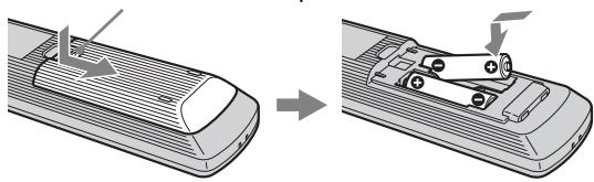 SONY RM-ED054 - To insert batteries into the remote - 1
