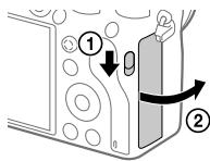 SONY ALPHA A7 III - Open the memory card cover. - 1