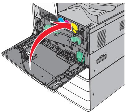 LEXMARK X950DE  -  X952DE -  X954D - Placez sua main sous le renfoncement de la cartouche de toner, pis sulevez-la delicatement. - 5