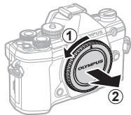 OLYMPUS OM-D E-M1X - Comment fixer un objectif sur l'appareil photo - 3