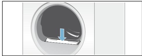 BOSCH WTN85228FF - Nettoyez le filtre à peluches - 4