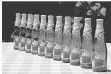 CANON EOS 10D - La zone de netteté varie de la manière suivante : - 3