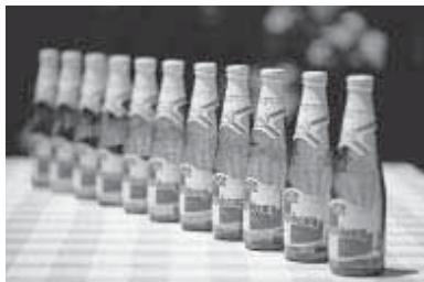 CANON EOS 10D - La zone de netteté varie de la manière suivante : - 2