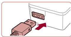 CANON X MARK II - Insertion et chargement de la batterie - 2