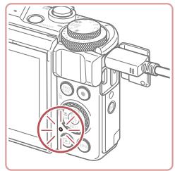 CANON X MARK II - Insertion et chargement de la batterie - 4