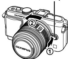 OLYMPUS E-PL6 - Retrait de l'objectif de l'appareil photo - 1