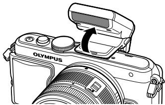 OLYMPUS E-PL6 - Pour utiliser le flash, relevez la tête de flash. - 1