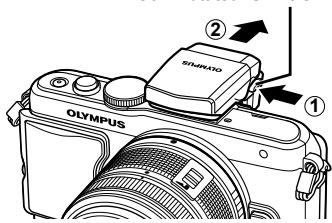 OLYMPUS E-PL6 - Pour utiliser le flash, relevez la tête de flash. - 2
