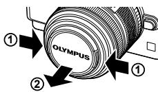 OLYMPUS E-PL6 - Retirez le bouchon de l'objectif. - 1