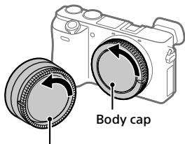 SONY A6500 - Remove the body cap from the camera and the rear lens cap from the rear of the lens. - 1