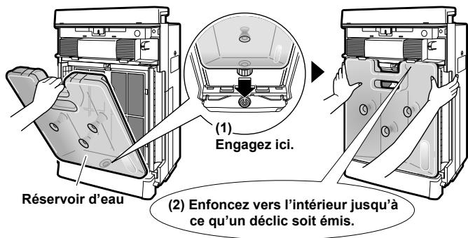 DAIKIN MCK75J - Remettez le réservoir d'eau en place. En saississant le réservoir d'eau par la poignée, enga résecrasant dans l'orifice situé en bas de l'activité principale - 1