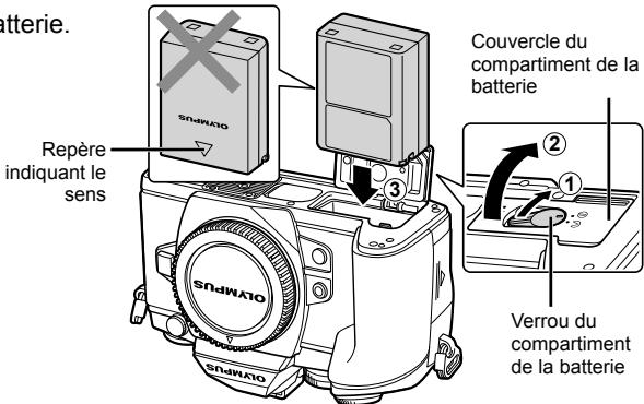 OLYMPUS E-M1 MARK III  -  E-M1 MKIII - Insertion de la batterie. - 1