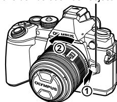 OLYMPUS E-M1 MARK III  -  E-M1 MKIII - Retrait de l'objectif de l'appareil photo - 2