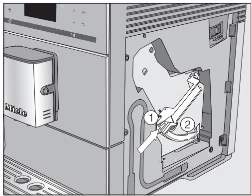MIELE CM 5510 - Introduire des pastilles de nettoyage dans l'unité de percolation - 2