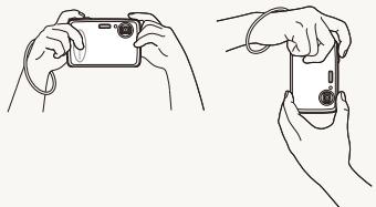 SAMSUNG PL10 - Tenez correctement l'appareil photo. - 1