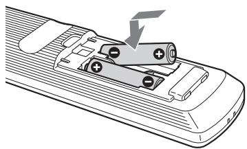SONY RM-ED007 - To insert batteries into the remote - 1