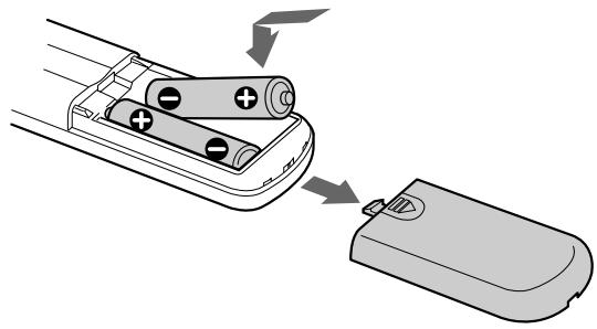 SONY CDP-CX250 - Sätta i batterierna i fjärrkontrollen - 1
