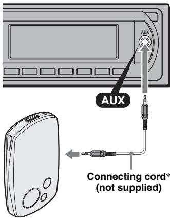 SONY CDX-GT517EE - Connecting the portable audio device - 1