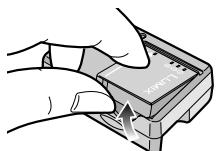 PANASONIC LUMIX DMC-FX12 - Retirez la batterie après la fin du chargement. - 1