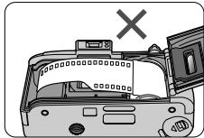 NIKON LITE TOUCH ZOOM 110S-QD - Pull the film leader across to the red index mark inside the film compartment. - 3