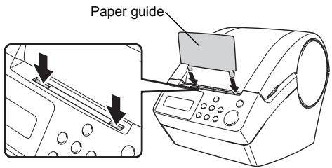 BROTHER P-TOUCH QL-650TD - Attach the paper guide to the front of the printer as shown on the right. - 1