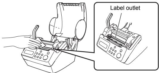 BROTHER P-TOUCH QL-650TD - Label outlet maintenance - 1