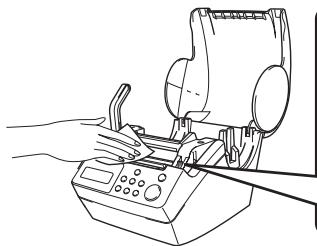 BROTHER P-TOUCH QL-650TD - Etikettenausgabe reinigen - 1