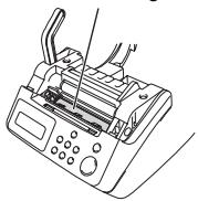BROTHER P-TOUCH QL-650TD - Etikettenausgabe reinigen - 2