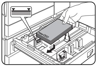 Diagram showing a hand pressing a component into a device with directional arrows indicating movement or force.