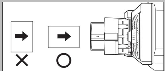 Diagram showing directional and circular symbols with arrows and a connector, likely representing a control or system interface.