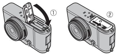 FUJIFILM PREMIUM X100S - Fermez le couvercle du compartiment de la batterie. - 1