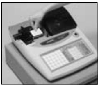 CASIO TK-T200 - Pour installer le rouleau de papier du journal - 2