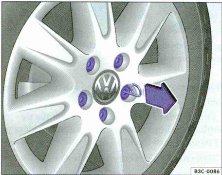 VOLKSWAGEN GOLF VI - Capuchons de boulons de roue. - 1