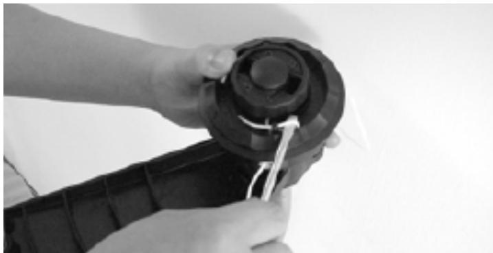 MTD YM - REPLACING TRIMMING LINE: EASY-LOAD HEAD - 1