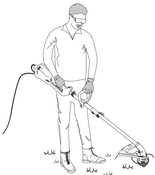 MTD YM137 - HOLDING THE TRIMMER - 2