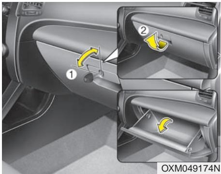 KIA SORENTO 2012 - Rangement dans la console centrale (si équipé) - 1