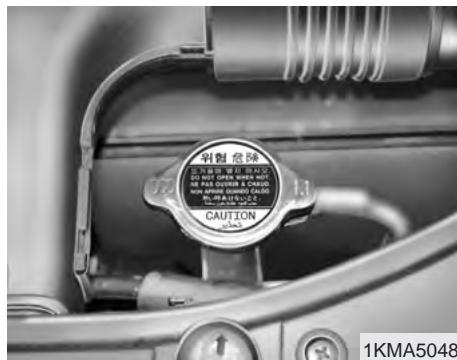 KIA SPORTAGE 2 - Ajouter du liquide de refroidissement - 1