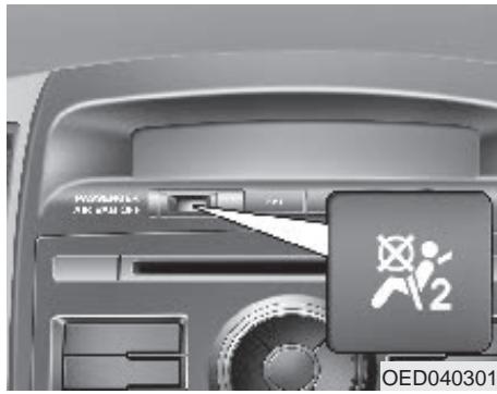 KIA CEED 2009 - Pour désactiver ou réactiver l'airbag du passager avant : - 1