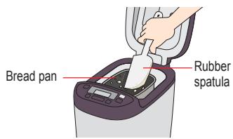 PANASONIC SD ZB2512 - Open the lid and scrape off the flour within 3 minutes when the beep sounds - 1