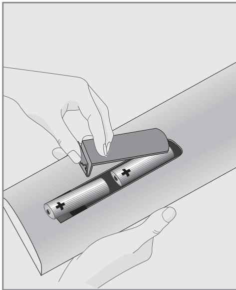 GRUNDIG 32VLE5503WG - Insertion des piles dans la télécommande - 1