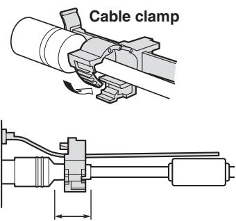 PANASONIC AW-HN38H - - How to secure the AC adaptor cable - 1