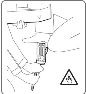 SONY XH90 - Remove one side of the Table-Top Stand at a time. Firmly hold the Table-Top Stand securely with both hands while the other people lift up the TV. - 2