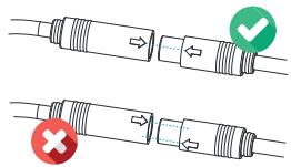 Diagram showing two types of cable connectors with directional arrows and checkmark indicators, one marked with a red X and the other with a green checkmark.