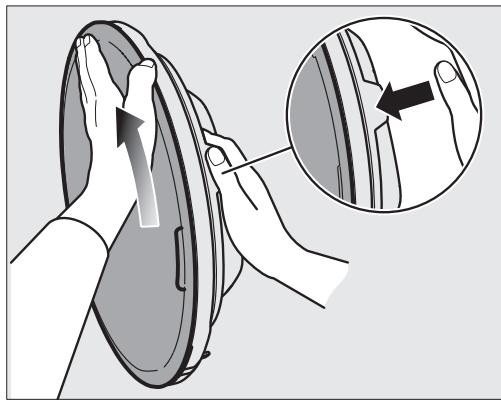 MIELE NC - Retirer le bandeau extérieur de la porte - 1