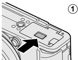 FUJIFILM X-T100 - Ouvrez le couvercle du compartiment de la batterie. - 1