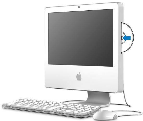 APPLE iMac - Insertion d'un CD ou DVD - 1