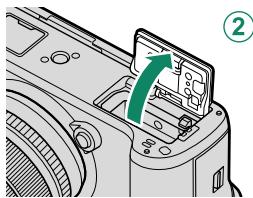 FUJIFILM XT3 - Ouvrez le couvercle du compartment de la batterie. - 3