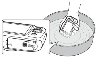 NIKON S33 - Nettoyage après une utilisation sous l'eau de l'appareil photo - 1