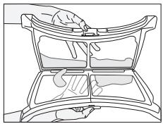 SMEG DHTS82EiN - Nettoyage du filtre à peluche / surface intérieure de la porte de chargement - 6